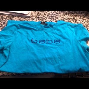 BEBE blue w/ jewel accent stretchy T-shirt Sz. M/L